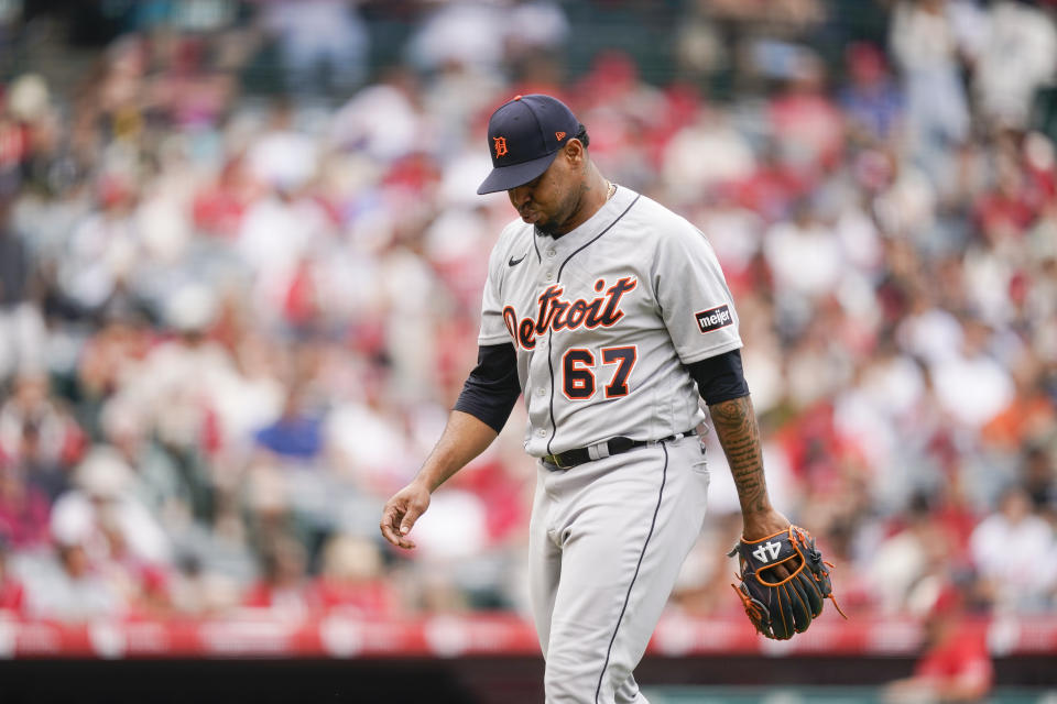 Detroit Tigers relief pitcher Jose Cisnero reacts after being replaced with relief pitcher Tyler Holton during the seventh inning of a baseball game against the Los Angeles Angels, Sunday, Sept. 17, 2023, in Anaheim, Calif. (AP Photo/Ryan Sun)