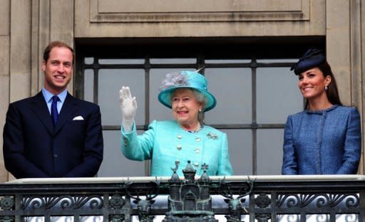 Queen Elizabeth II (C), with Prince William (L) and his wife Catherine, waves to the crowd in Nottingham in June. Prince William and Catherine bring their royal star power to Southeast Asia and the Pacific this week as part of a tour marking the queen's Diamond Jubilee