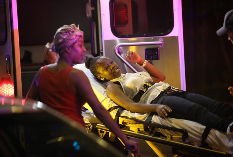 Emergency personnel transport victims from the scene where 12 people, including a 3-year-old, were shot at Cornell Square Park in the Back of the Yards neighborhood in Chicago, September 19, 2013. (Photo: E. Jason Wambsgans/Chicago Tribune/MCT via Getty Images)