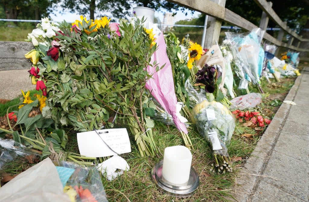 Floral tributes at Cator Park in Kidbrooke, south London (PA) (PA Wire)