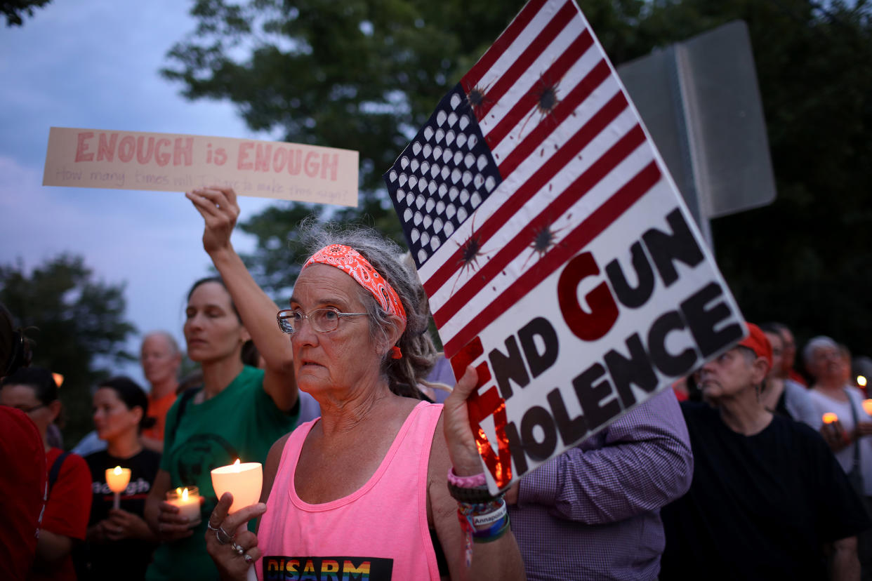 Vigil Held Outside NRA HQ For Mass Shooting Victims In Dayton And El Paso