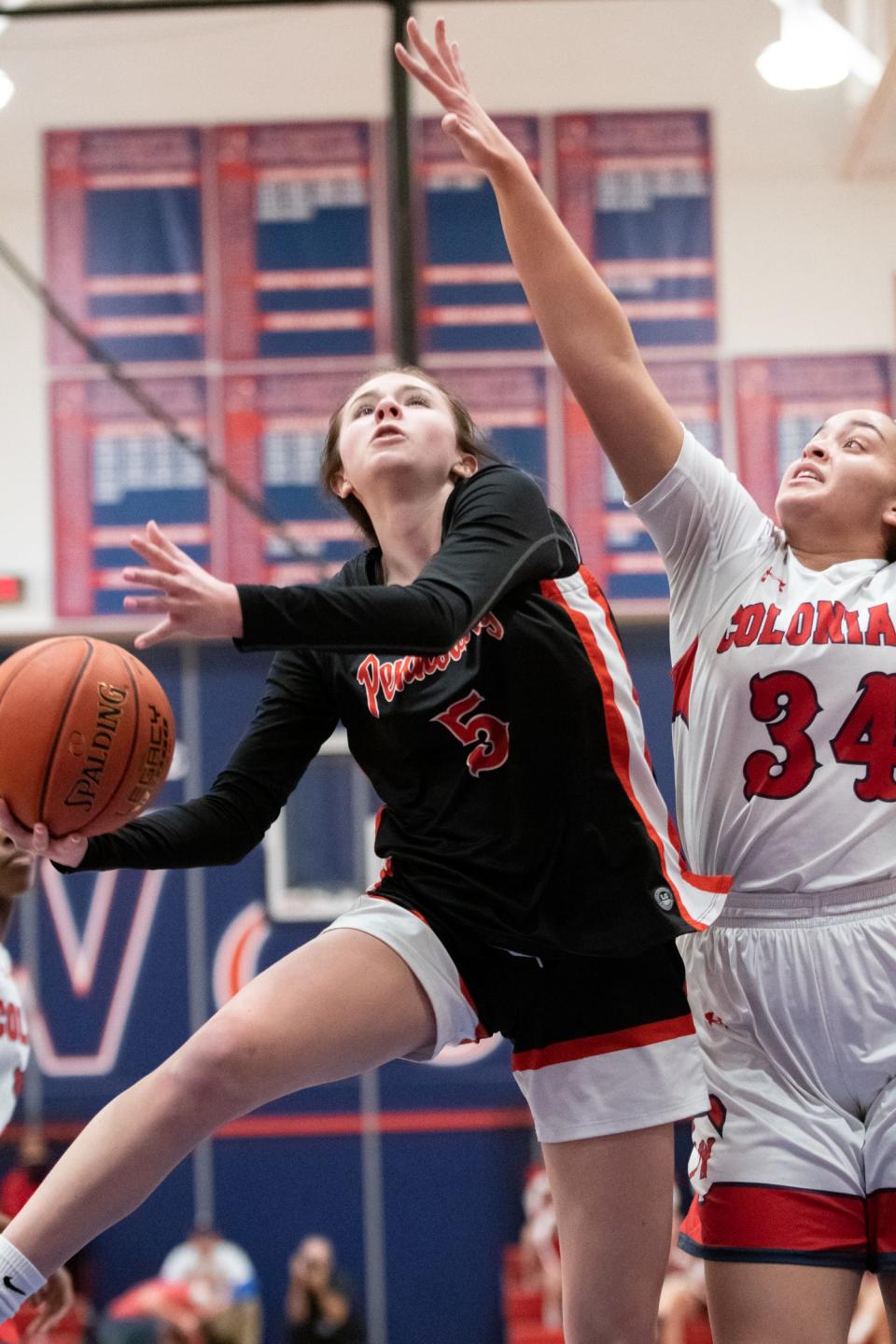 Pennsbury's Layla Matthias goes for a layup while covered by Plymouth Whitemarsh's Jordyn Thomas in a District One Class 6A semifinal game, on Wednesday, March 2, 2022, at Plymouth Whitemarsh High School. The Colonials defeated the Falcons 47-36 to move on to the district title game.