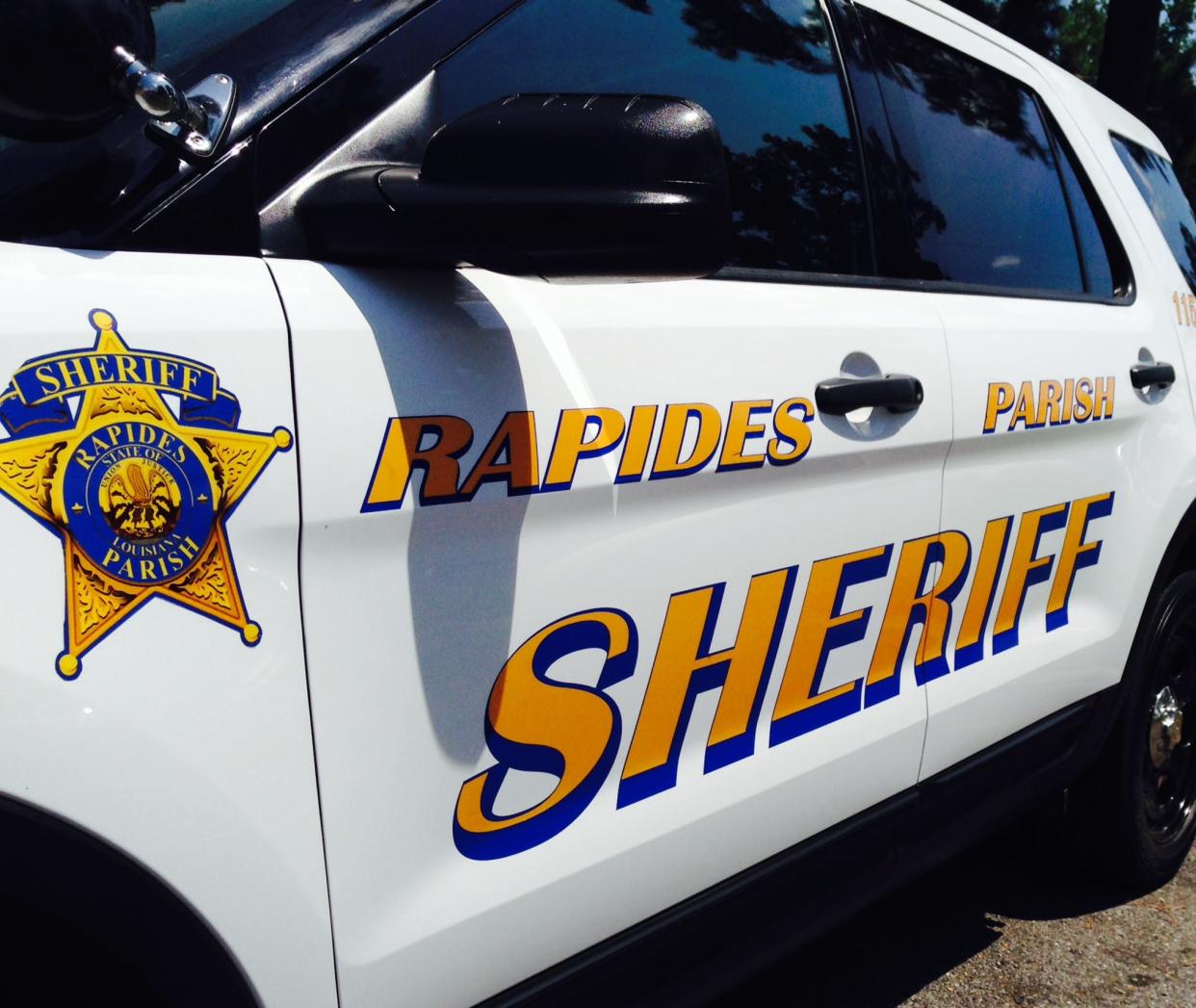 Three people have been arrested as the Rapides Parish Sheriff's Office searches an area around Elmer for a work release inmate who escaped Tuesday.