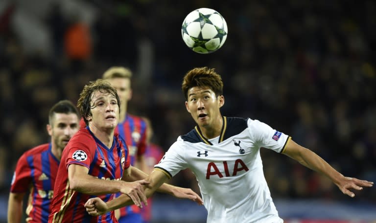 Tottenham Hotspur's South Korean striker Son Heung-Min (R) vies with CSKA Moscow's Brazilian defender Mario Fernandes during their Champions League football match in Moscow on September 27, 2016