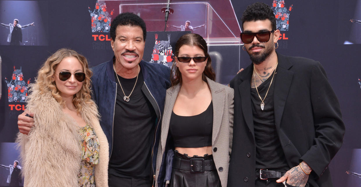 Lionel Richie with his three children: Nicole, Sofia and Miles. (PA Images)