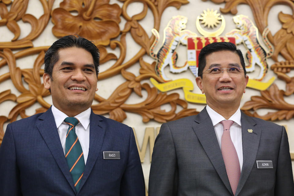 Economic Affairs Minister Datuk Seri Mohamed Azmin Ali and his deputy Mohd Radzi Md Jidin are pictured in Parliament October 30, 2019. — Picture by Yusof Mat Isa