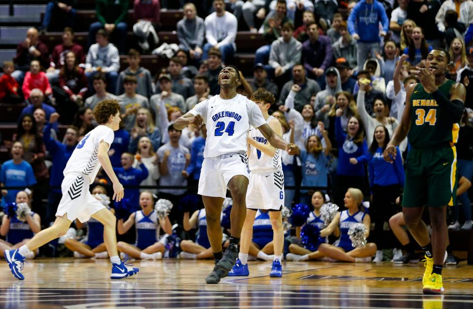 Aminu Mohammed celebrates after a foul gave the Greenwood Blue Jays control of the ball with seconds left on the clock during a game against Greensboro Day School at the Bass Pro Shops Tournament of Champions at JQH Arena on Friday, Jan. 17, 2020.