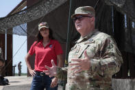 South Dakota Gov. Kristi Noem visited the U.S. border with Mexico on Monday, July 26, 2021, near McAllen, Texas. The Republican governor deployed roughly 50 National Guard troops to help with Texas’ push to arrest people crossing illegally and charge them with state crimes. (AP Photo/Stephen Groves)