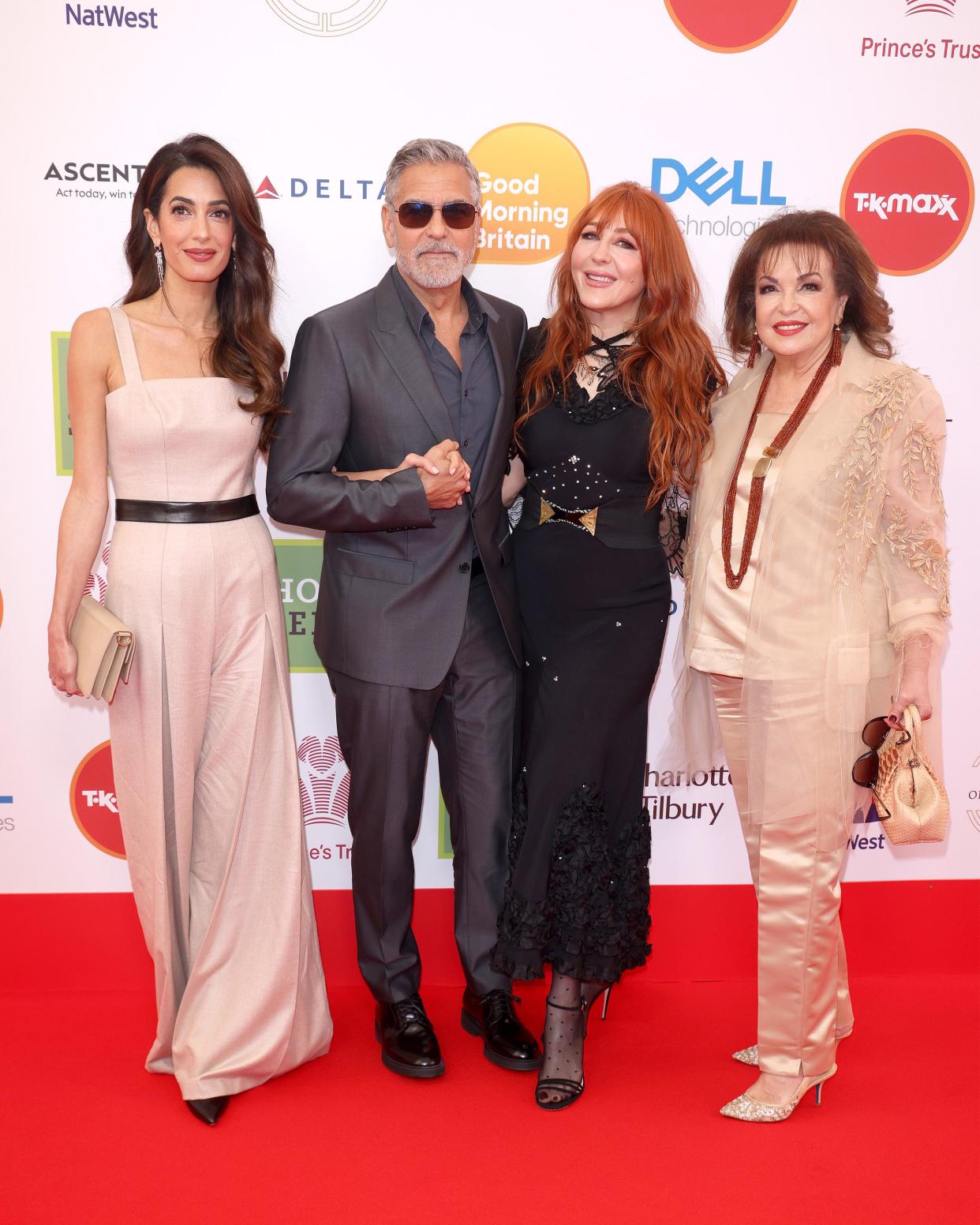 Charlotte Tilbury, Amal Clooney, George Clooney and Baria Alamuddin attend the Prince's Trust and TKMaxx & Homesense Awards 2023 (Neil Mockford / FilmMagic)