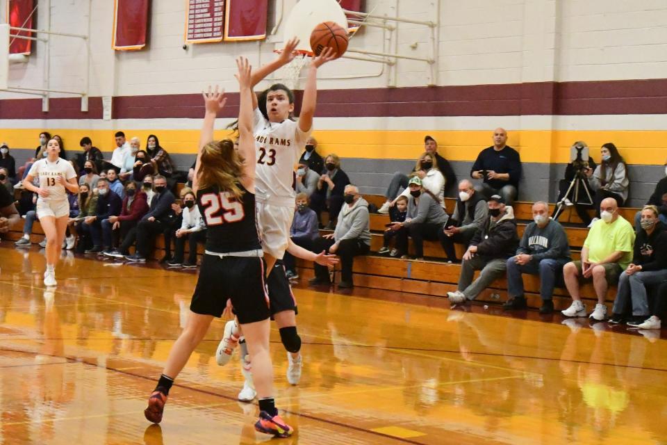 Gloucester Catholic junior Macie Nugent shoots over Cinnaminson forward Brooke Sztenderowicz