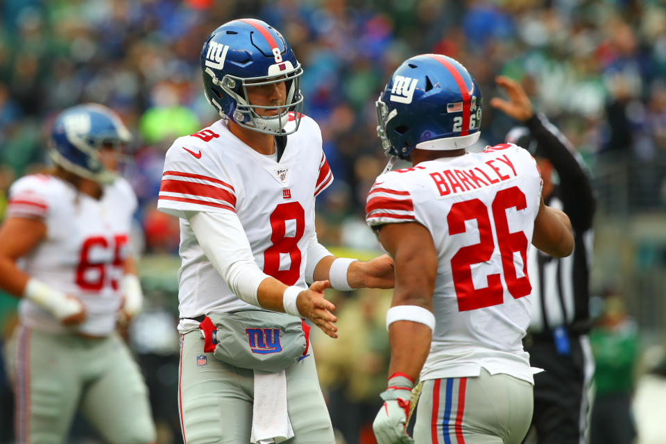 EAST RUTHERFORD, NJ - NOVEMBER 10:  New York Giants quarterback Daniel Jones (8) and New York Giants running back Saquon Barkley (26) during the National Football League game between the New York Jets and the New York Giants on November 10, 2019 at MetLife Stadium in East Rutherford, NJ.  (Photo by Rich Graessle/Icon Sportswire via Getty Images)