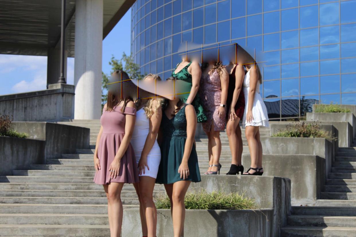 Three of the girls pictured here (in fitted white, solid green and maroon dresses) were denied entry. (Photo: Courtesy of Carrie Vittitoe)