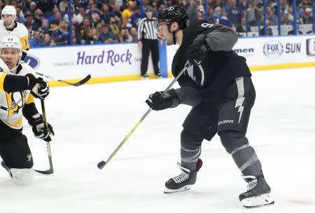 Feb 9, 2019; Tampa, FL, USA;Tampa Bay Lightning center Tyler Johnson (9) shoots and scores a goal against the Pittsburgh Penguins during the third period at Amalie Arena. Mandatory Credit: Kim Klement-USA TODAY Sports