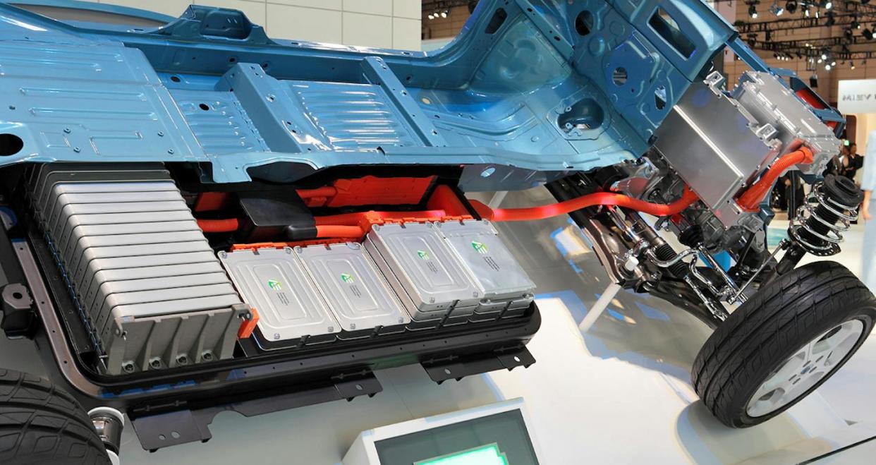 Cutaway view of a Nissan Leaf electric vehicle showing part of its battery array (silver boxes). <a href="https://en.wikipedia.org/wiki/Electric_vehicle_battery#/media/File:Nissan_Leaf_012.JPG" rel="nofollow noopener" target="_blank" data-ylk="slk:Tennen-gas/Wikipedia;elm:context_link;itc:0;sec:content-canvas" class="link ">Tennen-gas/Wikipedia</a>, <a href="http://creativecommons.org/licenses/by-sa/4.0/" rel="nofollow noopener" target="_blank" data-ylk="slk:CC BY-SA;elm:context_link;itc:0;sec:content-canvas" class="link ">CC BY-SA</a>