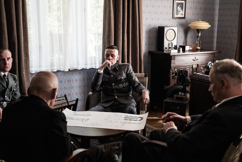 Nazi commandant Rudolf Höss (Christian Friedel, center) and his family live calmly amid the carnage in "The Zone of Interest."