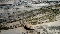 <p>A sinkhole is exposed at a mining zone close to Tierra Amarilla town, in Copiapo, Chile, August 1, 2022. REUTERS/Johan Godoy</p> 