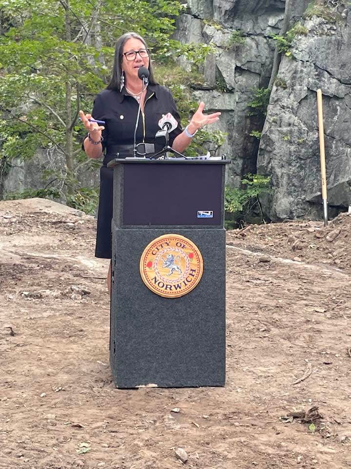 Mohegan Tribal Council of Elders Vice Chair Beth Regan speaking during the Uncas Leap Heritage Park groundbreaking Thursday.