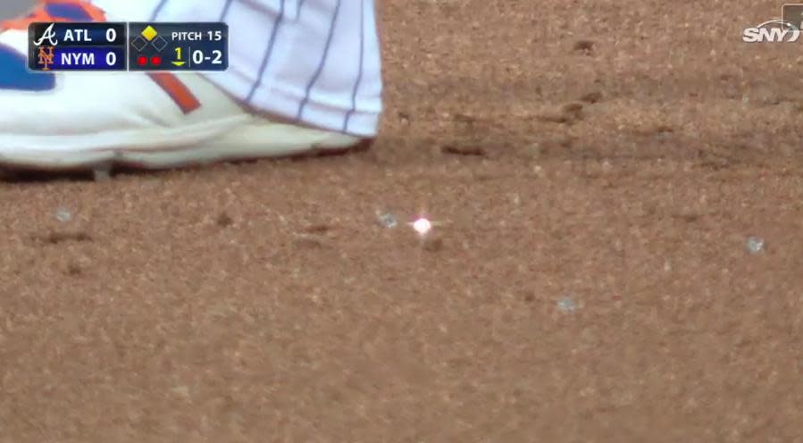 The remains of Yoenis Cespedes’ necklace were scattered over the infield. (MLB.TV)