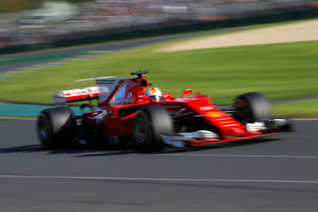 Formula One - F1 - Australian Grand Prix - Melbourne, Australia - 26/03/2017 - Ferrari driver Sebastian Vettel of Germany drives during the Australian Grand Prix. REUTERS/Jason Reed