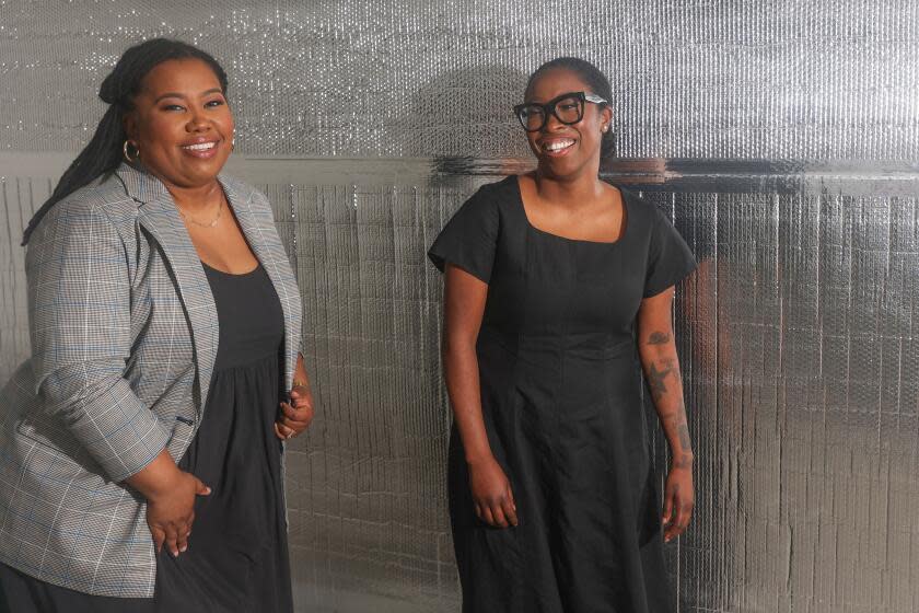 Los Angeles, CA - March 27: ChargerHelp co-founders Evette Ellis, left, and Kameale Terry, right, pose for a portrait at their headquarters on Wednesday, March 27, 2024 in Los Angeles, CA. ChargerHelp, in part trains people so they can get jobs maintaining and repairing electric vehicles chargers. (Michael Blackshire / Los Angeles Times)