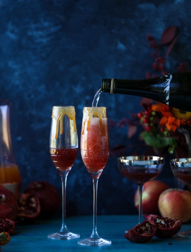 <strong>Get the <a href="https://www.howsweeteats.com/2017/10/cider-mimosas-apple-pomegranate/" target="_blank">Pomegranate Cider Mimosas With A Salted Caramel Rim</a> recipe from How Sweet Eats</strong>