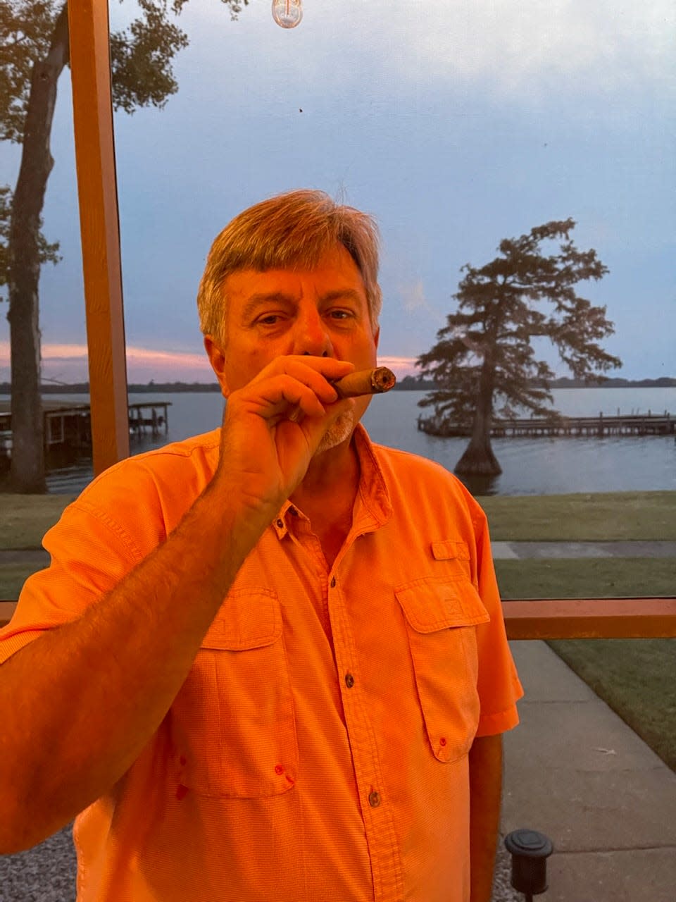 Tennessee fan David Smith reached 62 years old before he ever smoked a cigar. He enjoyed a light at Horseshoe Lake in Arkansas after the Vols upset Alabama 52-49 on Oct. 15, 2022.
