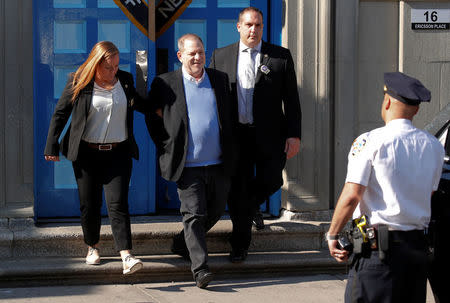 Film producer Harvey Weinstein leaves the 1st Precinct in Manhattan in New York, U.S., May 25, 2018. REUTERS/Mike Segar