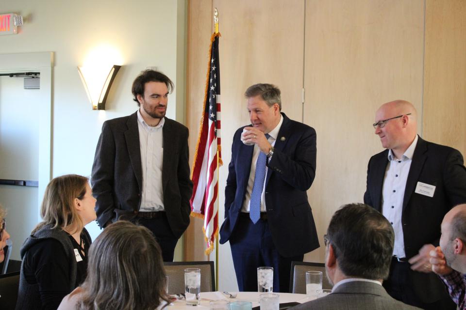 New Hampshire Gov. Chris Sununu talks with attendees at the State of the State 2024 event Tuesday, March 12 at Atlantic Grill in Rye.