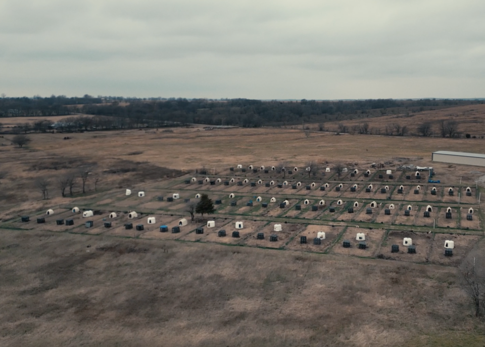 Aerial of the animal testing lab Beagle Freedom Project shut down, where beagles have been held in tiny metal cages and outside in the elements surrounded by electrified fencing awaiting cruel and toxic chemical testing. All 200 dogs and cats at this lab have been surrendered to Beagle Freedom Project who will transform the property into a rescue, rehab and adoption center and provide these and other testing survivors with the proper care, love and freedom they deserve and prepare them for families of their own.