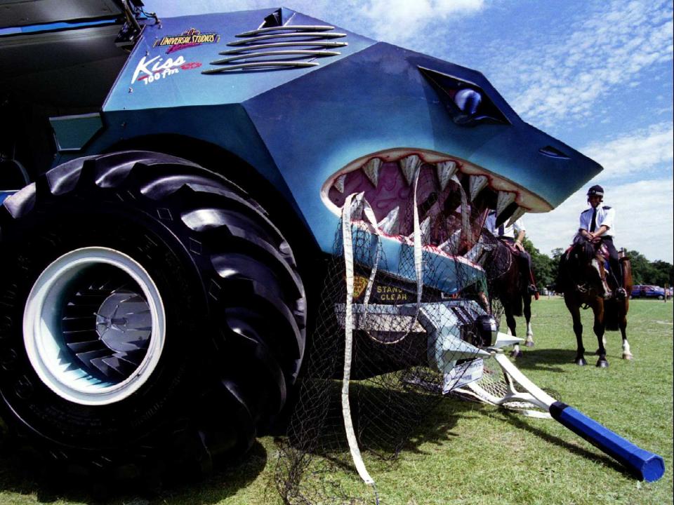 Mounted Police in Wimbledon park examine the "Landshark", a thirty foot long road vehicle designed look like a Great White shark.