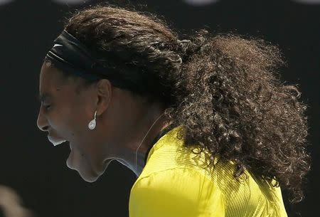 Serena Williams of the U.S. reacts during her quarter-final match against Russia's Maria Sharapova at the Australian Open tennis tournament at Melbourne Park, Australia, January 26, 2016. REUTERS/Issei Kato