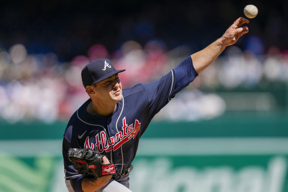 Atlanta Braves starting pitcher Jared Shuster throws during the first inning of a baseball game against the Washington Nationals at Nationals Park, Sunday, April 2, 2023, in Washington. (AP Photo/Alex Brandon)