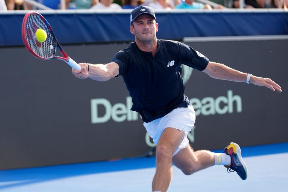 Tommy Paul hits a return to Frances Tiafoe during their semifinal match at the Delray Beach Open tennis tournament, Saturday, Feb. 17, 2024, in Delray Beach, Fla. (AP Photo/Lynne Sladky)