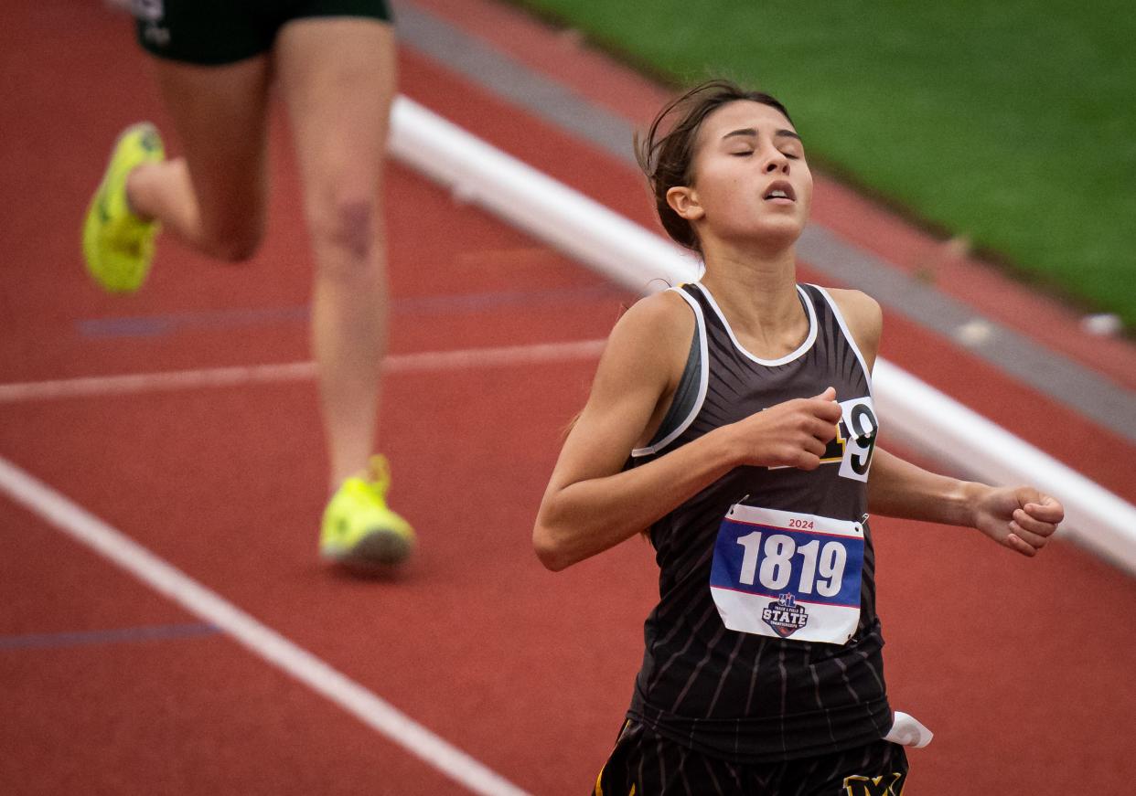 Menard's Danni Ruiz crosses the line to win the 800-meter run at the 1A UIL State track and field meet, Saturday, May 4, 2024, at Mike A. Myers Stadium in Austin.