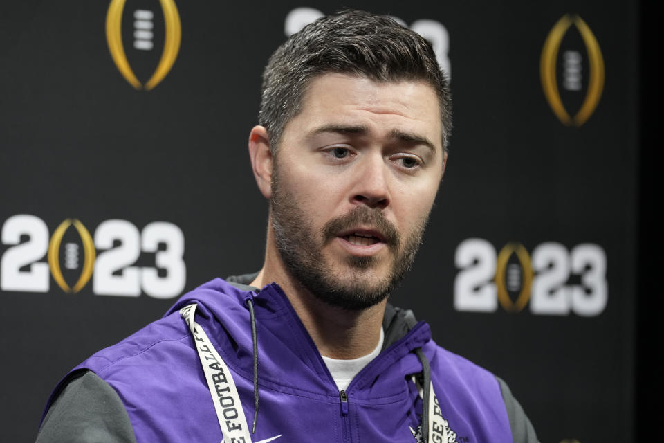 TCU offensive coordinator Garrett Riley speaks during a media day ahead of the national championship NCAA College Football Playoff game between Georgia and TCU, Saturday, Jan. 7, 2023, in Los Angeles. The championship football game will be played Monday. (AP Photo/Marcio Jose Sanchez)