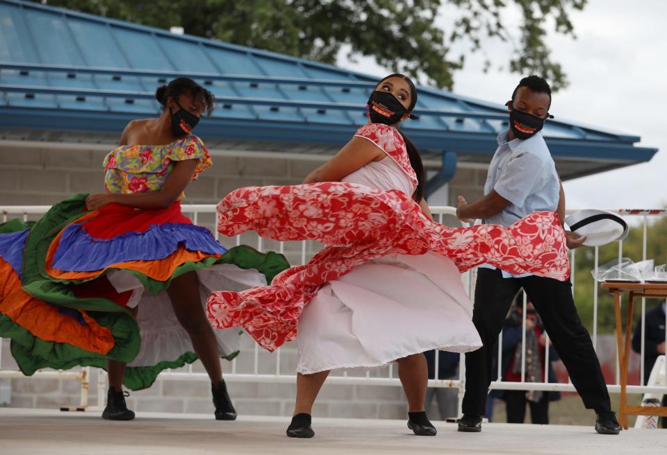 Ieance Gamble, MaKayla Lee Santiago and Shawndell Lewis with Borinquen Dance Theatre perform on the stage as part of the the official opening of La Marketa at the International Plaza on North Clinton Avenue on Oct. 8, 2020.