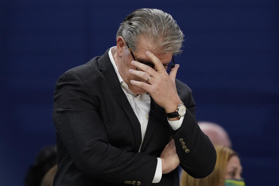 UConn head coach Geno Auriemma reacts during the second half of a college basketball game in the final round of the Women's Final Four NCAA tournament Sunday, April 3, 2022, in Minneapolis. (AP Photo/Charlie Neibergall)