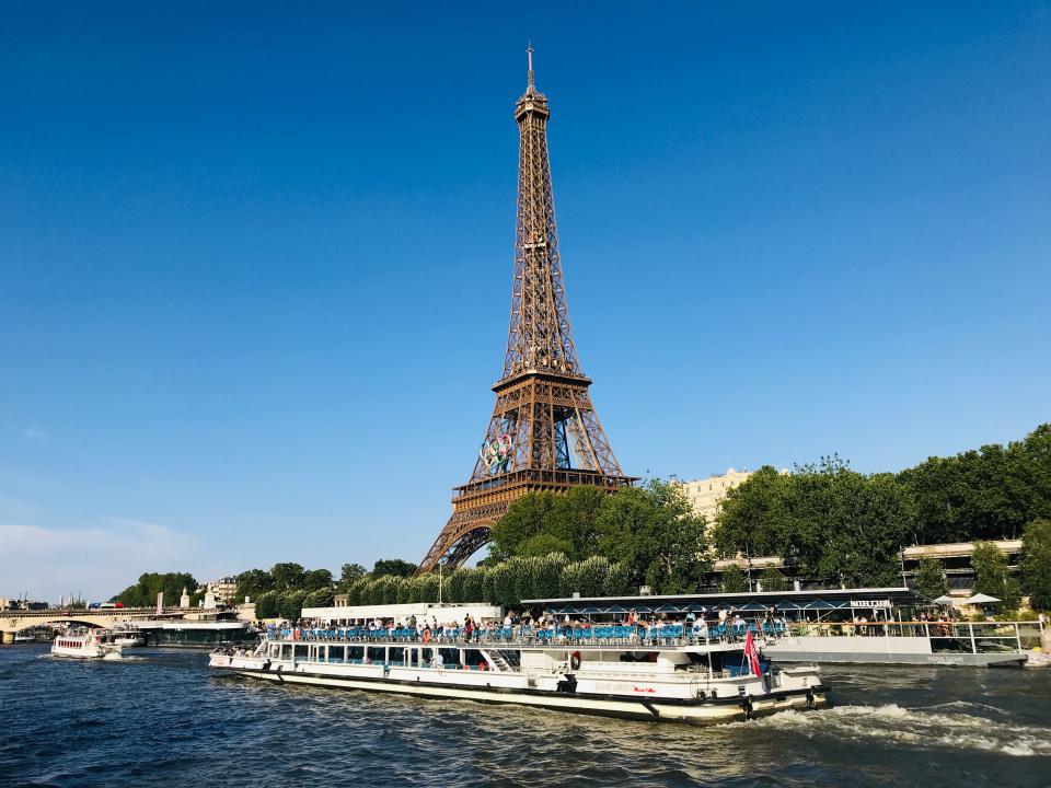 view of the eiffle tower from the seine in paris