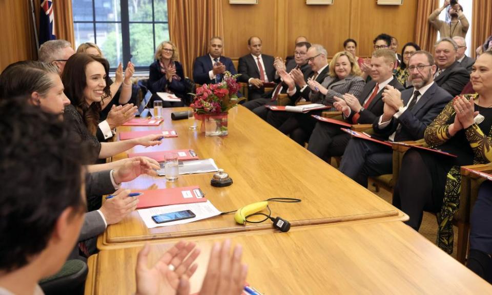 Jacinda Ardern is applauded at her first Labour caucus meeting since the election.