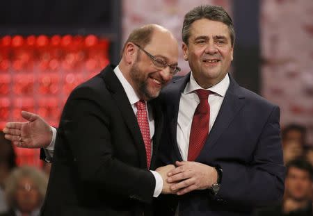 Outgoing Social Democratic Party (SPD) leader Sigmar Gabriel and incoming party leader and candidate in the upcoming general elections Martin Schulz during SPD party convention in Berlin, Germany, March 19, 2017. REUTERS/Axel Schmidt