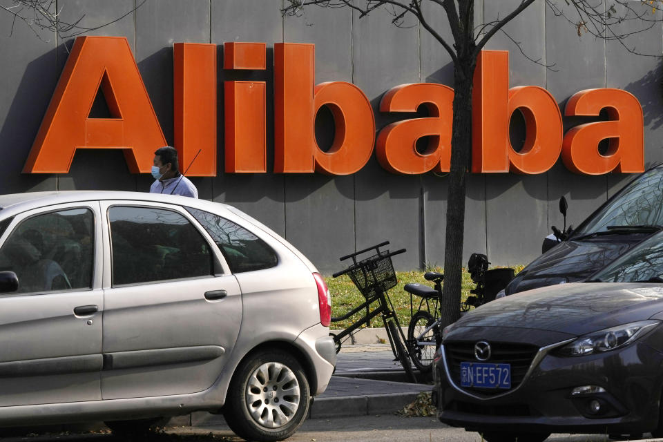 FILE - The Alibaba logo is seen outside a building in Beijing on Nov. 16, 2021. A judge in New York has ruled that Alibaba must face a lawsuit by a U.S. toymaker alleging that the Chinese ecommerce giant's online platforms were used to sell counterfeit Squishmallow. (AP Photo/Ng Han Guan, File)