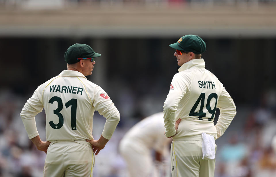 David Warner and Steve Smith speaking.