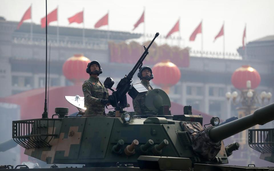 Some of the Chinese universities in question are ultimately controlled by Beijing or its military - AP