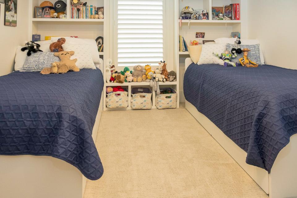 Two trundle beds with plenty of under-bed storage space makes this room ideal for younger visitors.