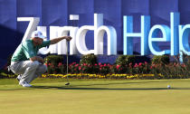 John Rollins lines up a shot on the 9th hole during the second round of the Zurich Classic golf tournament at TPC Louisiana in Avondale, La., Friday, April 27, 2012. (AP Photo/Gerald Herbert)