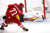 <p>Ilya Kovalchuk #71 of Olympic Athlete from Russia attempts a shot in overtime against Danny Aus Den Birken #33 of Germany during the Men’s Gold Medal Game on day sixteen of the PyeongChang 2018 Winter Olympic Games at Gangneung Hockey Centre on February 25, 2018 in Gangneung, South Korea. (Photo by Ronald Martinez/Getty Images) </p>