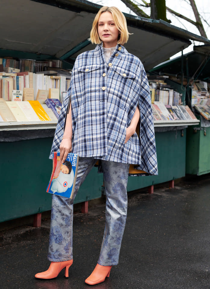 <p>Louis Vuitton poncho, blouse, jeans, and bracelet. Dorateymur boots. Photo by Horst Diekgerdes/Shotview.</p>