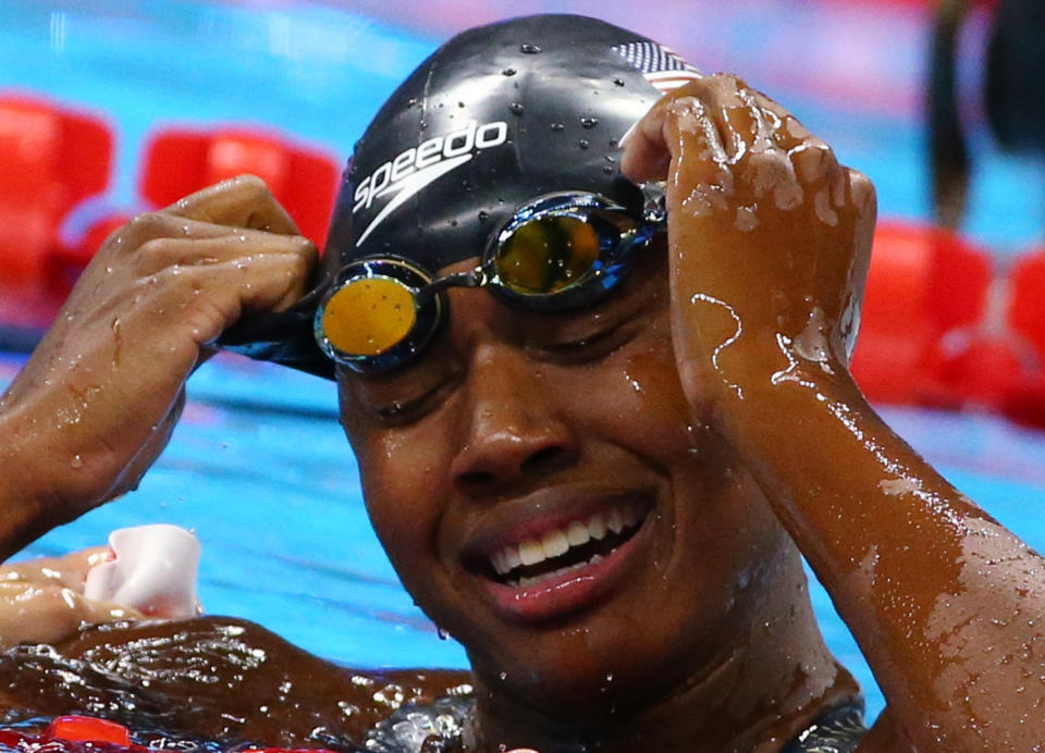 Simone Manuel reacts after winning the gold and setting a new Olympic record. (REUTERS)