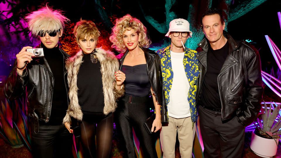 From left: Austin Butler as Andy Warhol and Kaia Gerber as Edie Sedgwick, Cindy Crawford as Sandy Olsson from the movie "Grease," Presley Gerber as Raoul Duke from the movie "Fear and Loathing in Las Vegas" and Rande Gerber as Danny Zuko from "Grease." - Matt Winkelmeyer/Getty Images