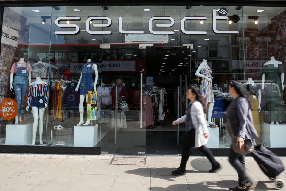 Shoppers are seen walking past Select fashion chain store in north London. Select enters into administration, putting 1,800 jobs at risk. There are 169 Select stores across the UK and is owned by Turkish entrepreneur Cafer Mahiroglu. (Photo by Dinendra Haria / SOPA Images/Sipa USA)